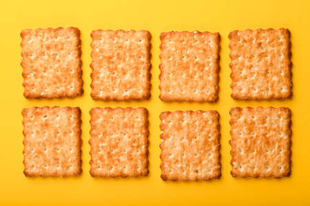 Sesame cracker, cracker, cookie cracker on different backgrounds.の写真素材