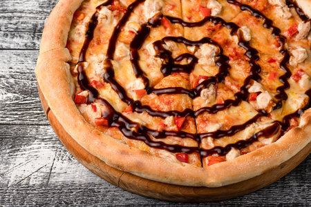 Pizza, hot pizza on a white wooden background, side and top view