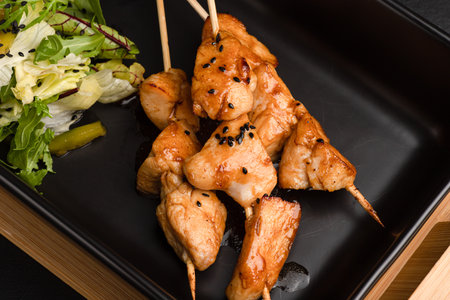 chicken kebab, chicken kebab on a black background side viewの写真素材