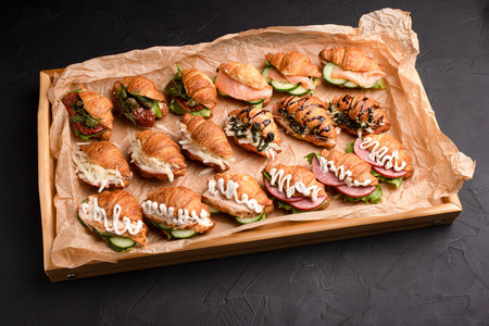 Croissants with fillings, croissants with different fillings on a black background