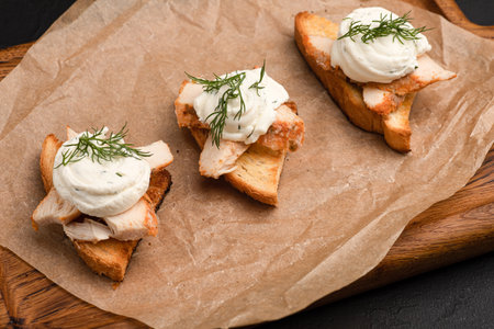 Bruschetta, different bruschetta with different fillings on a black backgroundの写真素材