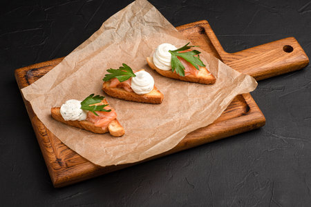 Bruschetta, different bruschetta with different fillings on a black background