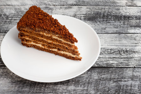 Sweet cake, dessert on a wooden white backgroundの写真素材