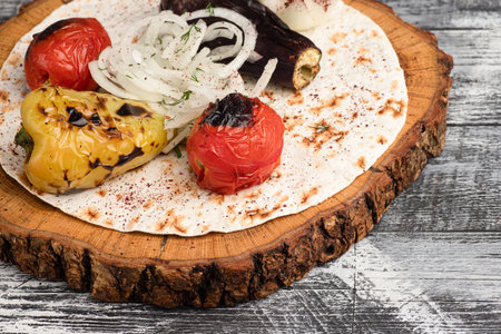 Vegetables, baked vegetables on a wooden white backgroundの写真素材
