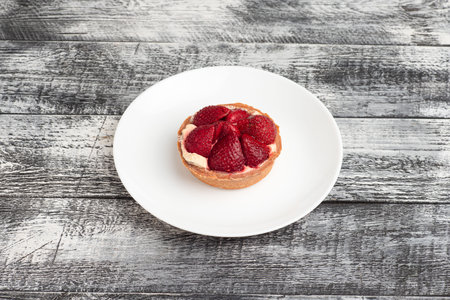 Dessert, berry dessert on a wooden white backgroundの写真素材