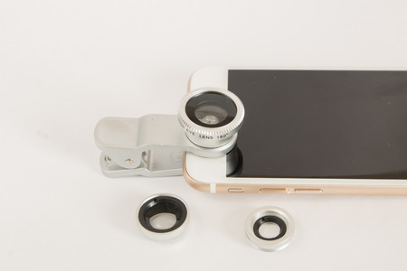 Fisheye macro set for mobile phone white backgroundの写真素材