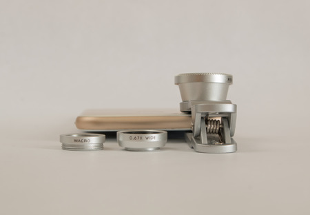 Fisheye macro set for mobile phone white backgroundの写真素材