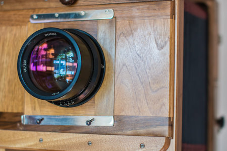 Lens of old big wooden camera macro view, concept