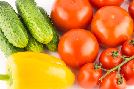 Cucumber, tomato, pepper and fennel isolated on white background close up.の写真素材