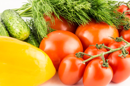 Cucumber, tomato, pepper and fennel isolated on white background close up.の写真素材