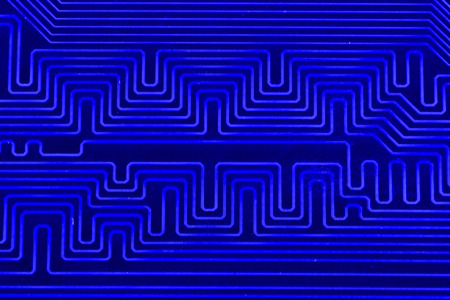 Conductive tracks on the motherboard of Printed Circuit Board close macro.の写真素材