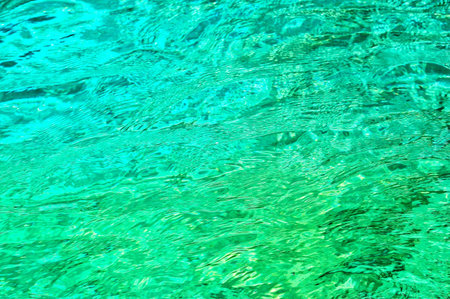 texture of transparent light green sea water