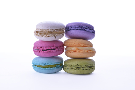 Sweet and colourful french macaroons or macaron on white background, Dessert.の写真素材