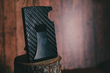 card holder on a wooden stand on a brown backgroundの写真素材