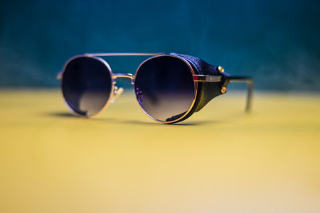 steampunk sunglasses with leather inserts on a dark backgroundの写真素材