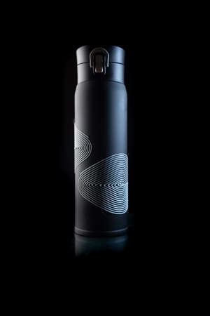 sports thermo mug black on a black backgroundの写真素材