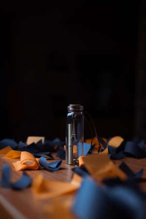 transparent pendant a present for good luck on a dark backgroundの写真素材