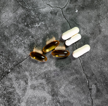 amino acids, omega 3 taurine for health on a gray backgroundの写真素材