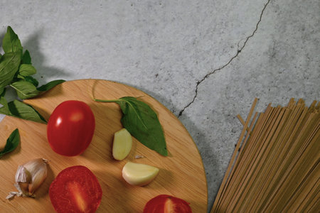 fresh tomato with garlic and basil leaf, salad ingredientsの写真素材