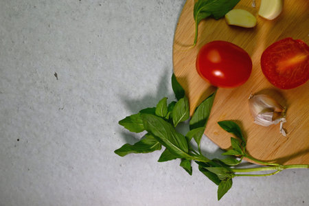 fresh tomato with garlic and basil leaf, salad ingredientsの写真素材