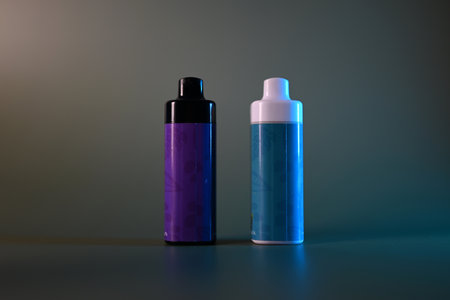 Multi-colored electronic cigarettes for vaping on a gray backgroundの写真素材