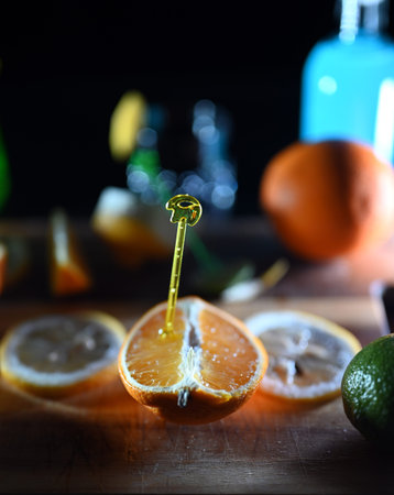 citrus fruits cut for fresh juice on table