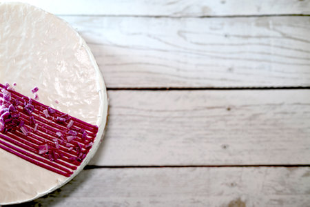 creamy cake on light wooden backgroundの写真素材