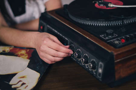A young man in camouflage and a backpack in the mountainsの写真素材