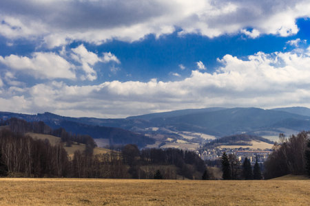 Summer landscape and the dark blue sky with sunset in mountains