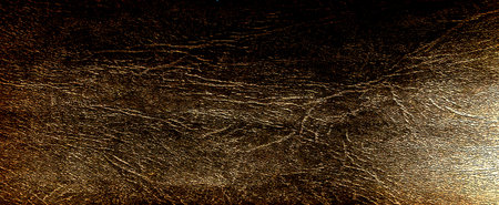 Brown leather texture closeup. Useful as background for design-works.