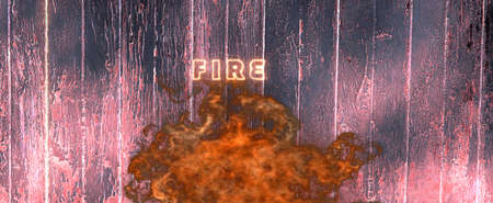 Charred wooden background with burning flame in foreground.の写真素材