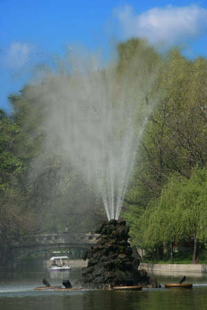 Boat walk on lake in parkの写真素材