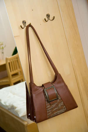 Handbag. Handbag, bed and chair. Hallstand with mirror.の写真素材