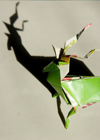  zool made with green  paper on a white backgroundの写真素材