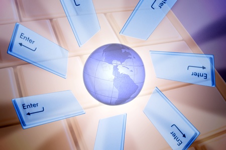 digital world concept: keys Enter around globeの写真素材
