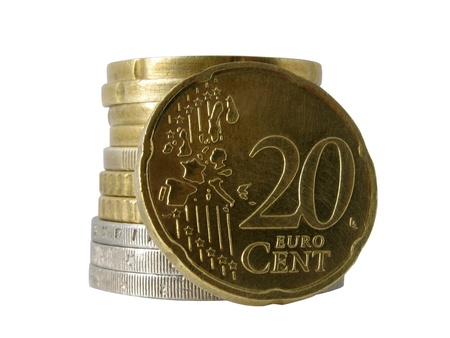 twenty euro cent over pile of other coins                                の写真素材