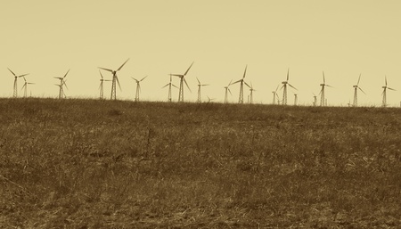 wind turbines at countryside in sepiaの写真素材