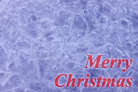 blue ice background with red Merry Christmas congratulationの写真素材
