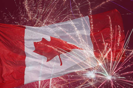 flag of Canada over fireworksの写真素材