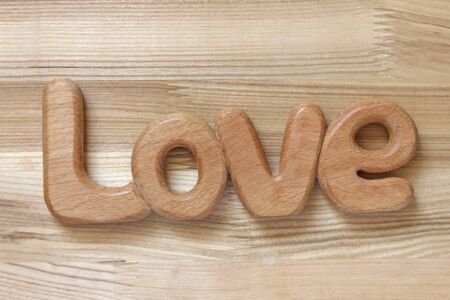 word love on wooden backgroundの写真素材