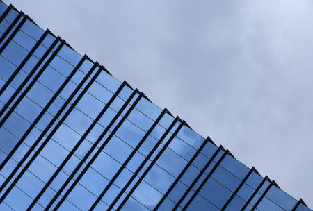 clouds above pyramid of ofiice buildingの写真素材