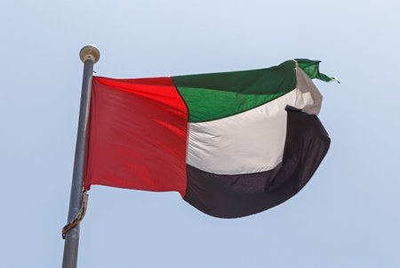 flag of United Arab Emirates on flagpole