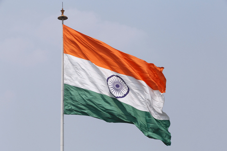 state flag of India on flagpole at Connaught Place in Delhiの写真素材