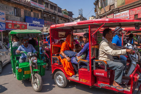 NEW DELHI, INDIA - MARCH 13, 2018: tuk-tuks on street of Chandni Chowk