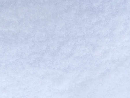 abstract natural background: close up of white snowの写真素材
