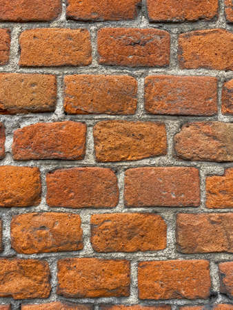 detail of old brown brick wall backgroundの写真素材