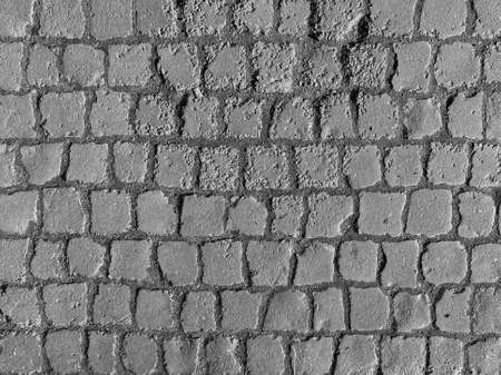 abstract construction background: black and white photo of square paving stonesの写真素材