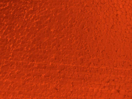 abstract backdrop: close up of foam plastic painted in redの写真素材