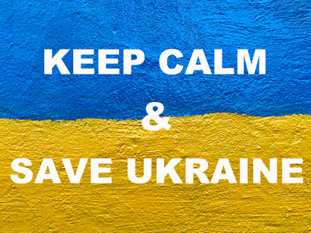 Keep Calm and Save Ukraine message on Ukrainian flag painted on wallの写真素材