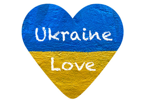 message Ukraine Love on heart with Ukrainian flag painted on wallの写真素材